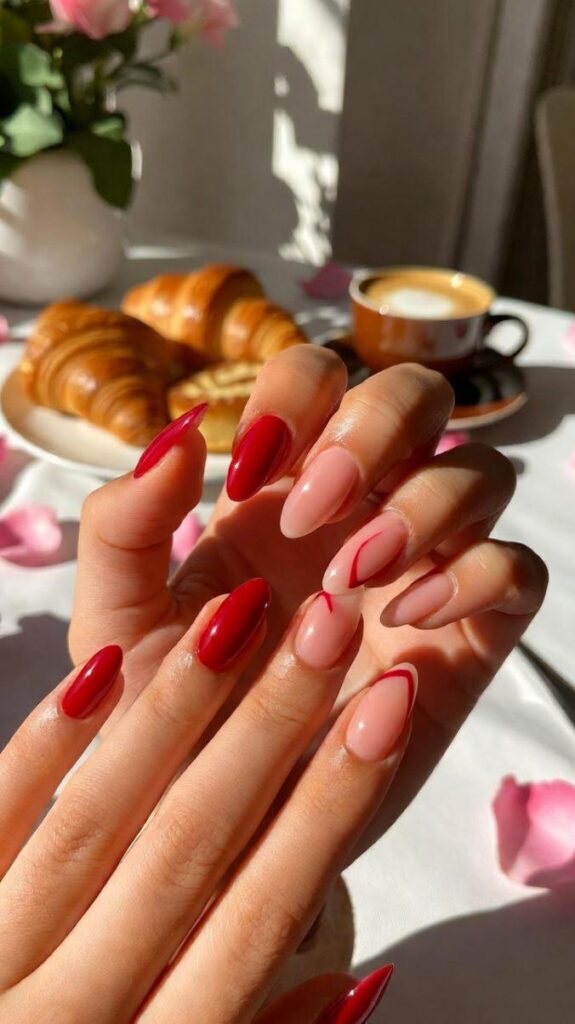 Unghie per San Valentino 2026 colori crimson (#DC143C) e blush pink (#FFC0CB) su unghie almond per brunch romantico