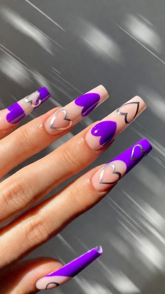 Unghie per San Valentino 2026 su unghie coffin alterna cuori pieni vuoti movimento dinamico airbrush stencil