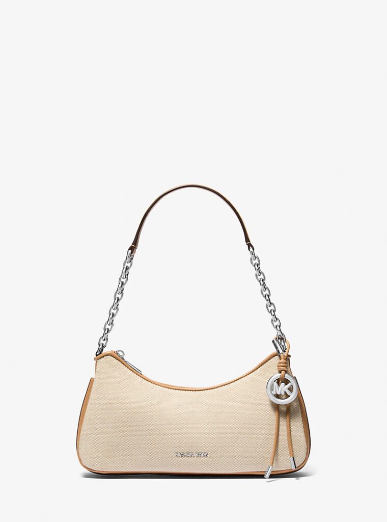 MICHAEL Michael Kors Pochette Nolita media in tela di misto cotone di colore beige con finiture marroni e catena argentata su sfondo bianco.