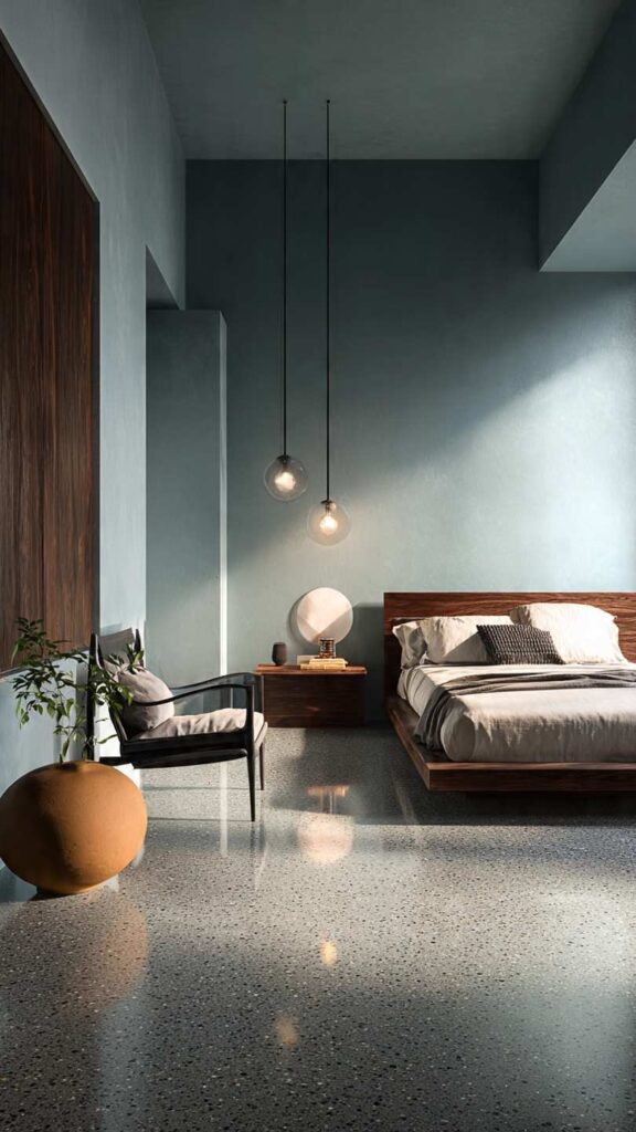 Pareti celeste polvere camera da letto contemporanea con pavimento in resina grigio caldo