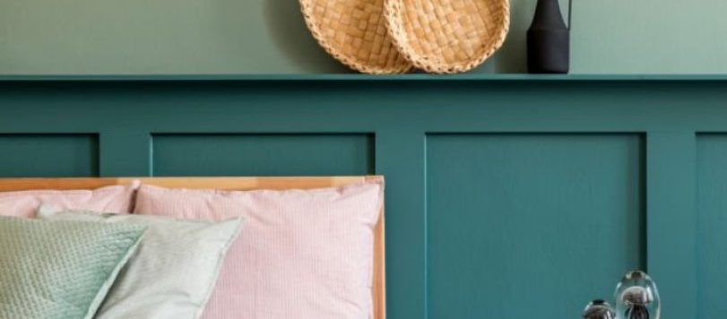 Stylish composition of bedroom interior. Beautiful bed sheets, blanket and pillows. Template. Modern home staging